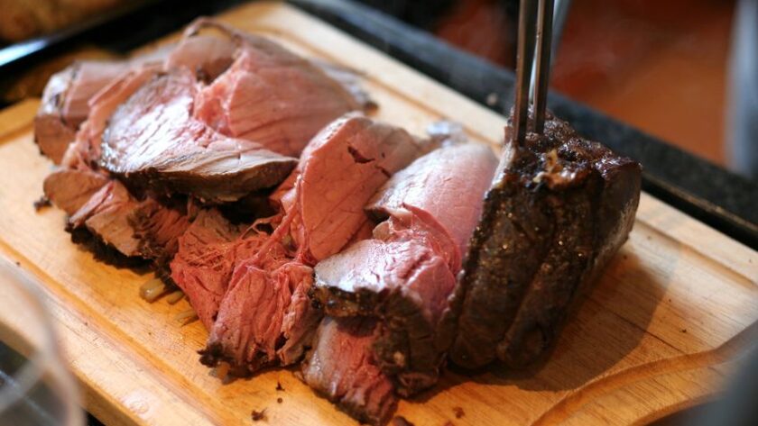 Oven Roast Beef on a wooden cutting board