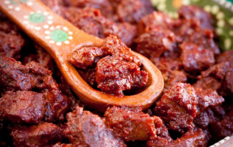 Santa Fe Style Carne Adovada with decorative spoon