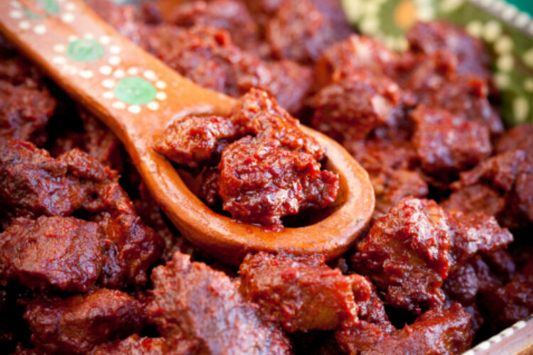 Santa Fe Style Carne Adovada with decorative spoon
