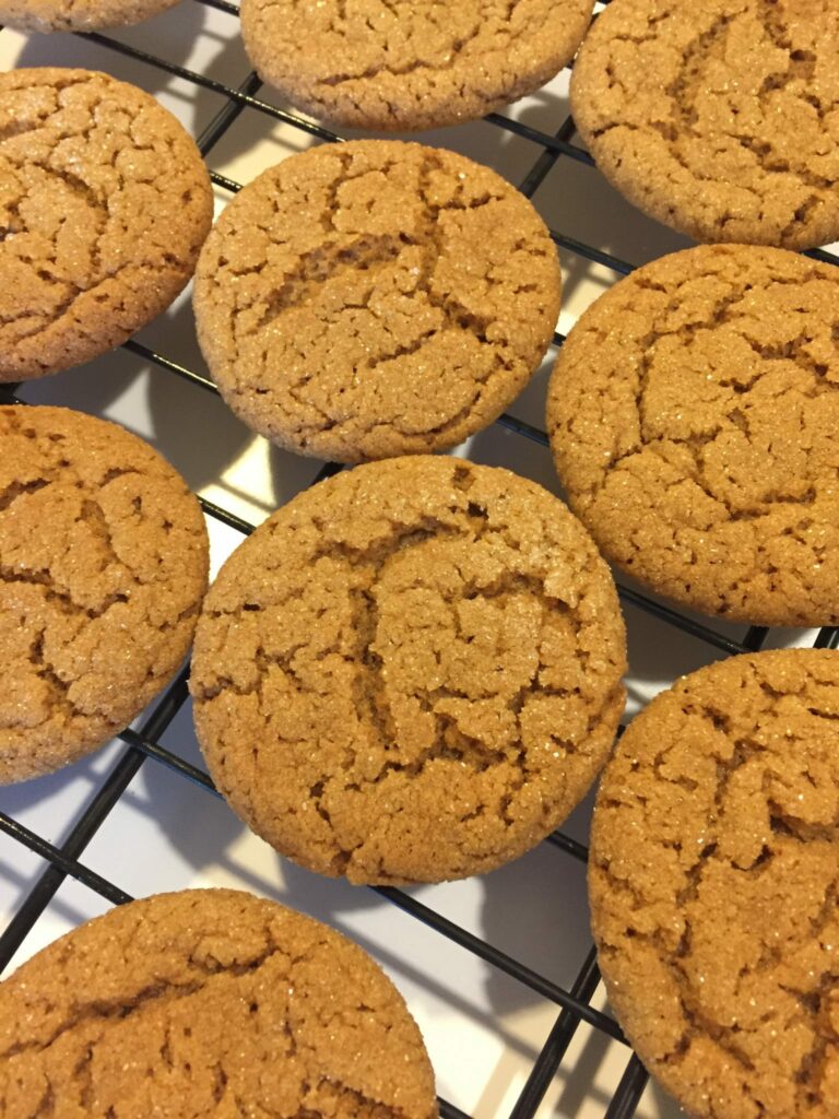 Soft Molasses Cookies cooling on a rack