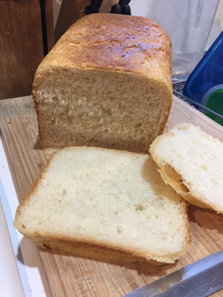 Bread Machine Potato Bread, sliced on a cutting board