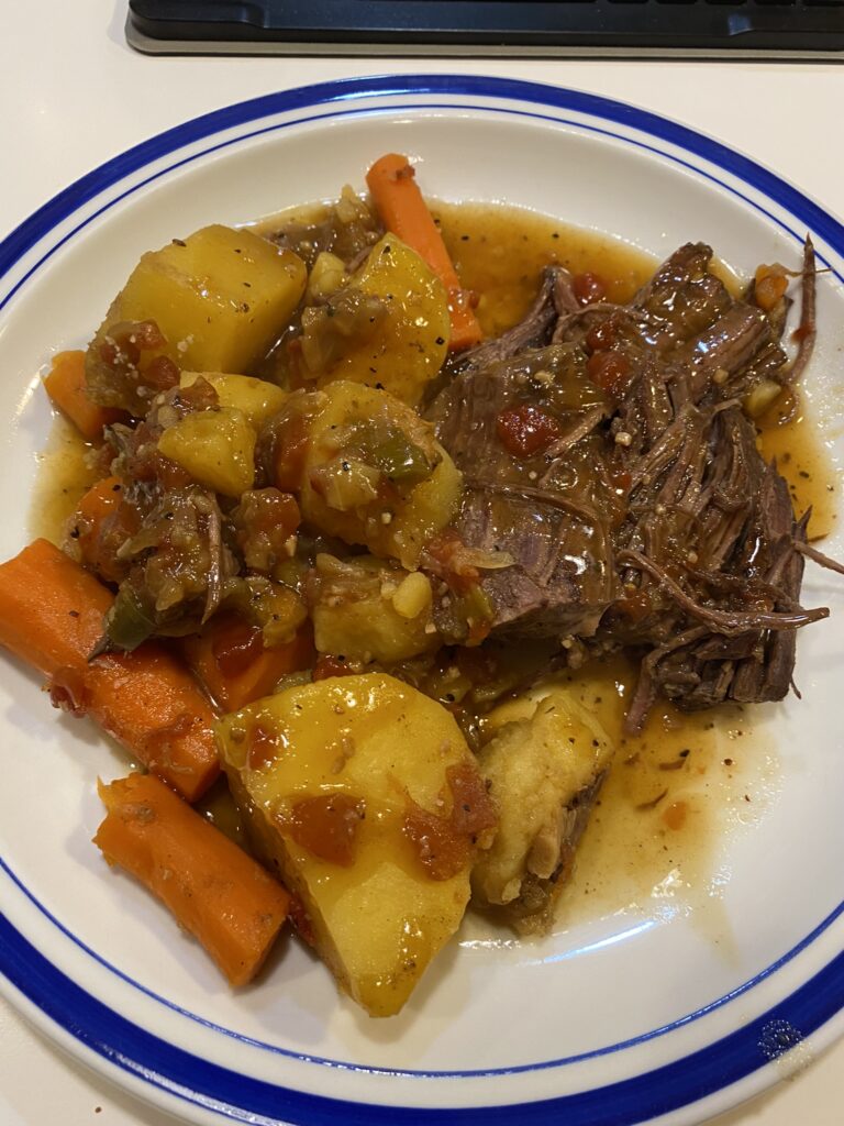 Instant Pot Chuck Roast with potatoes and carrots on a plate