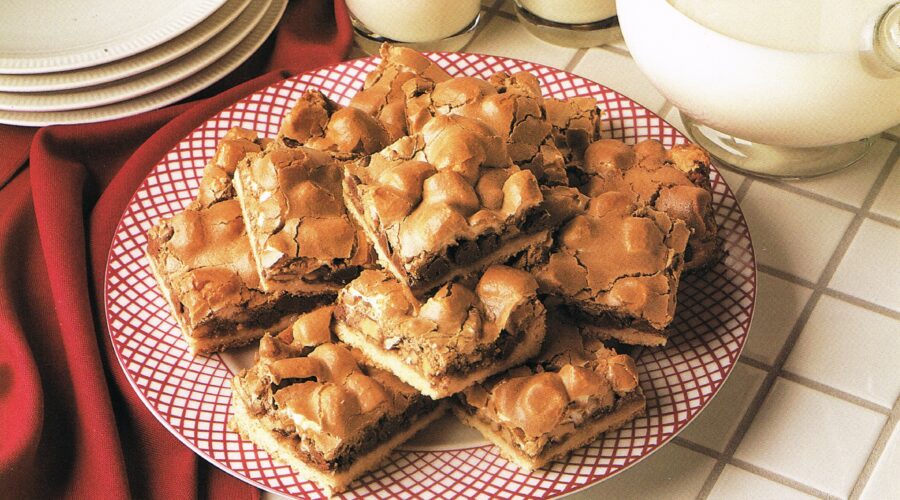 Mississippi Mud Bars on a plate with milk.