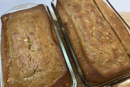 Two loaves of Easy Banana Bread Recipe in glass baking pans