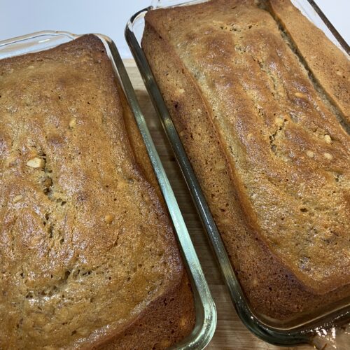 Two loaves of Easy Banana Bread Recipe in glass baking pans