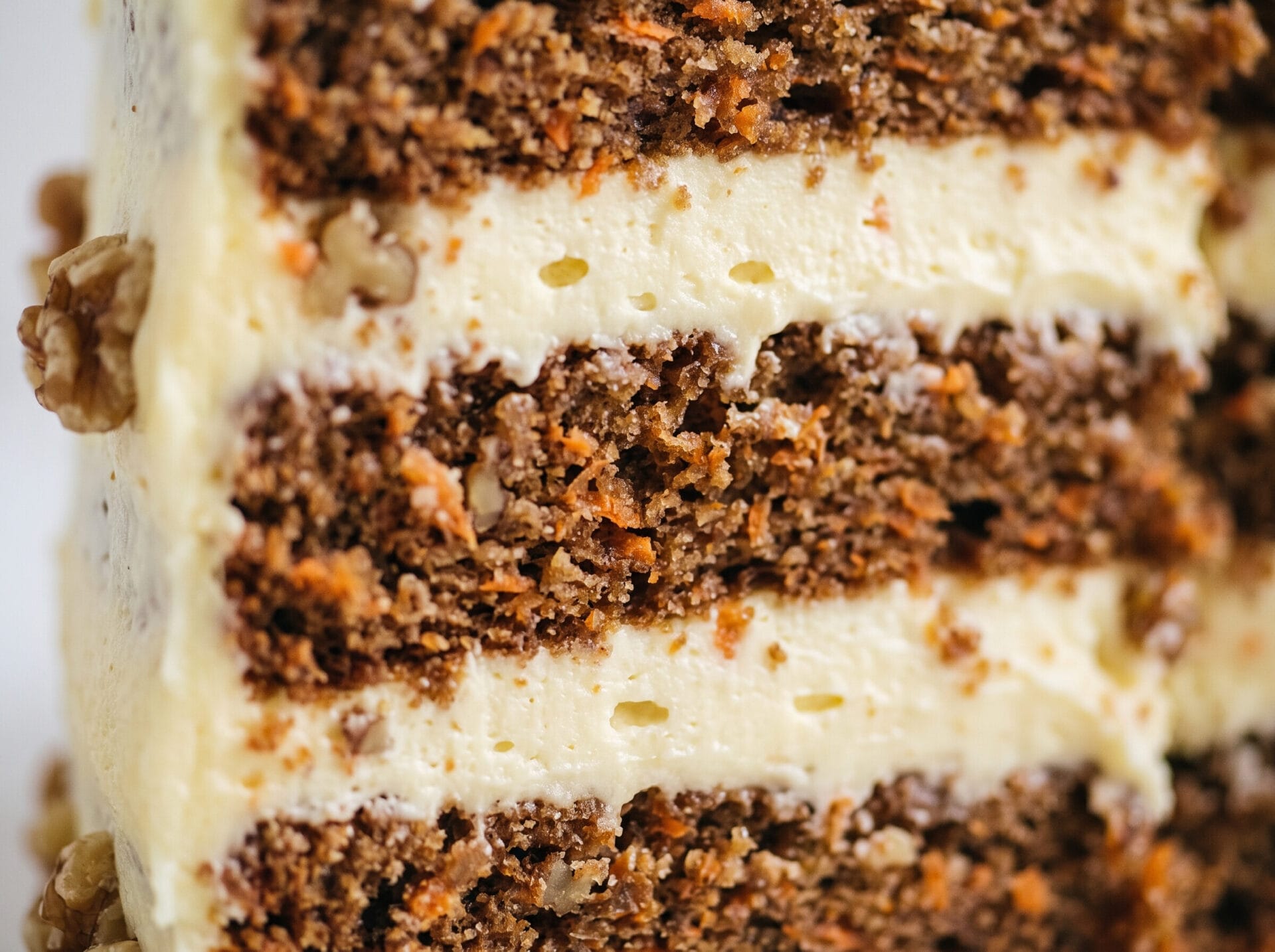 Tender high-altitude carrot cake showing the light crumb.