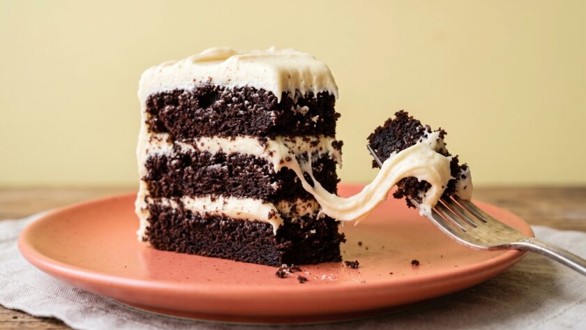White Chocolate Cream Cheese Buttercream on a frosted chocolate cake.