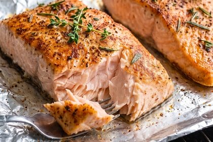easy oven-baked salmon just coming out of the broiler