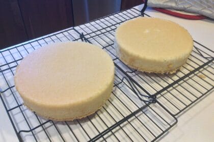 Hot Milk layer cakes cooling on a rack