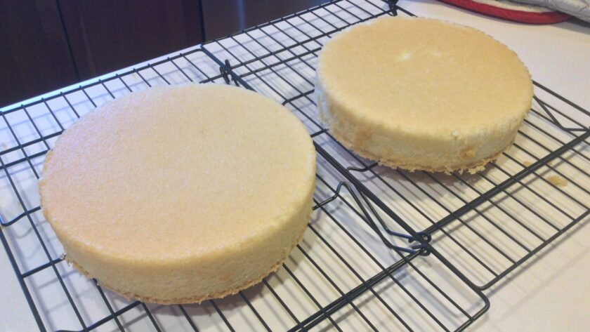 Hot Milk layer cakes cooling on a rack
